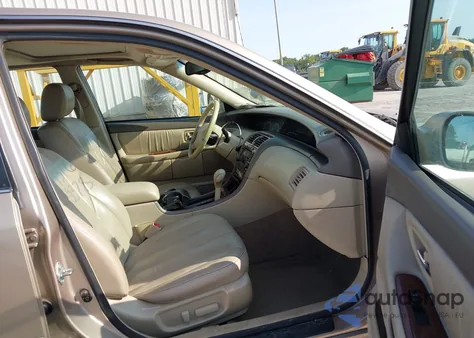 2001 Toyota Avalon Xls z USA, uszkodzony, nr VIN 4T1BF28B61U182009